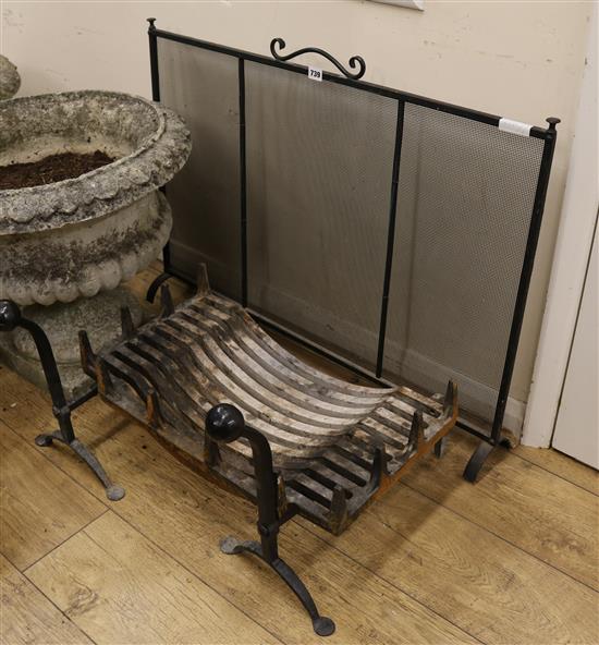 A pair of iron fire dogs, a grate and a screen, w.92cm